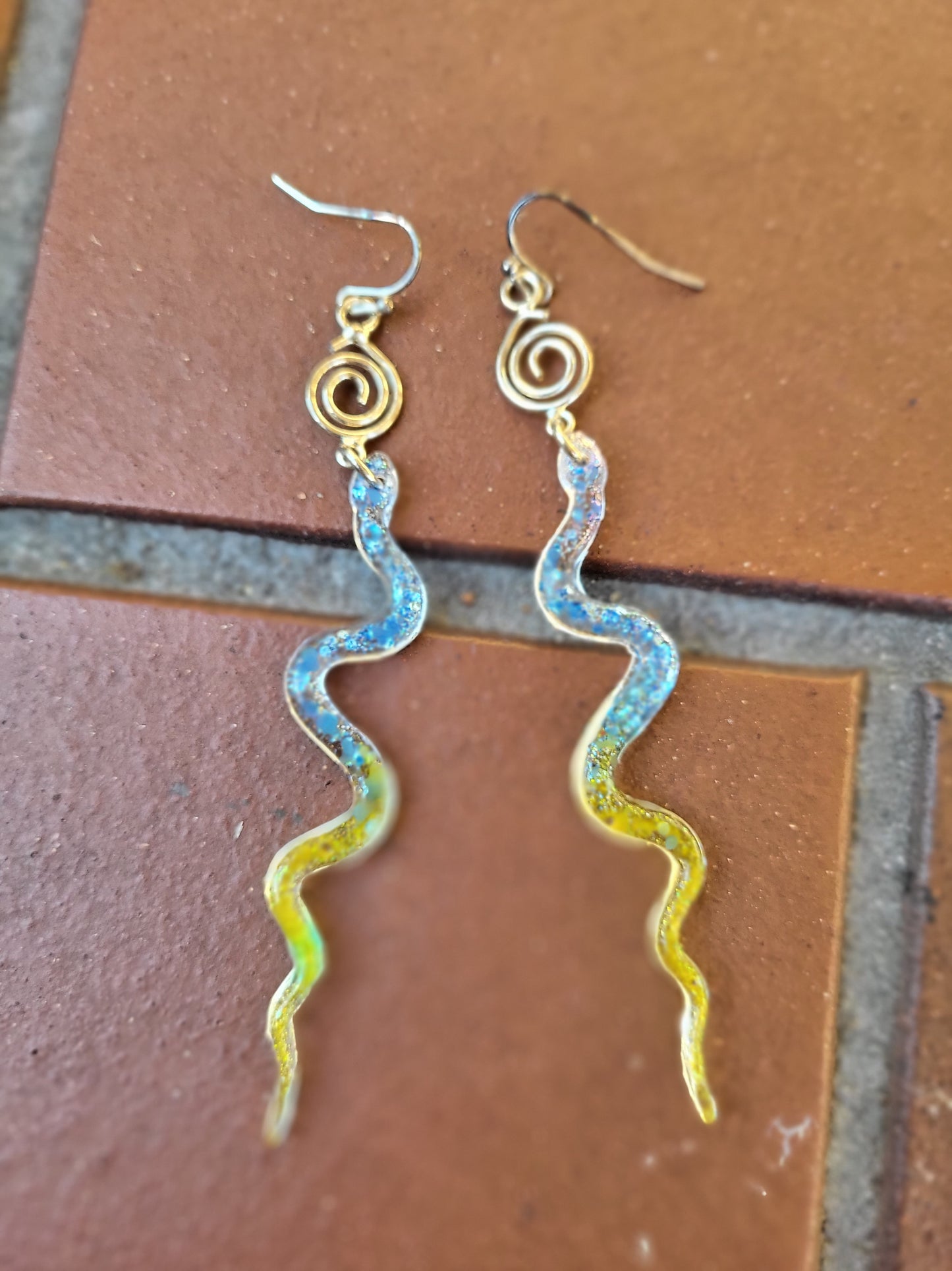 Blue and Yellow Resin Snake Earrings With Swirl Charm