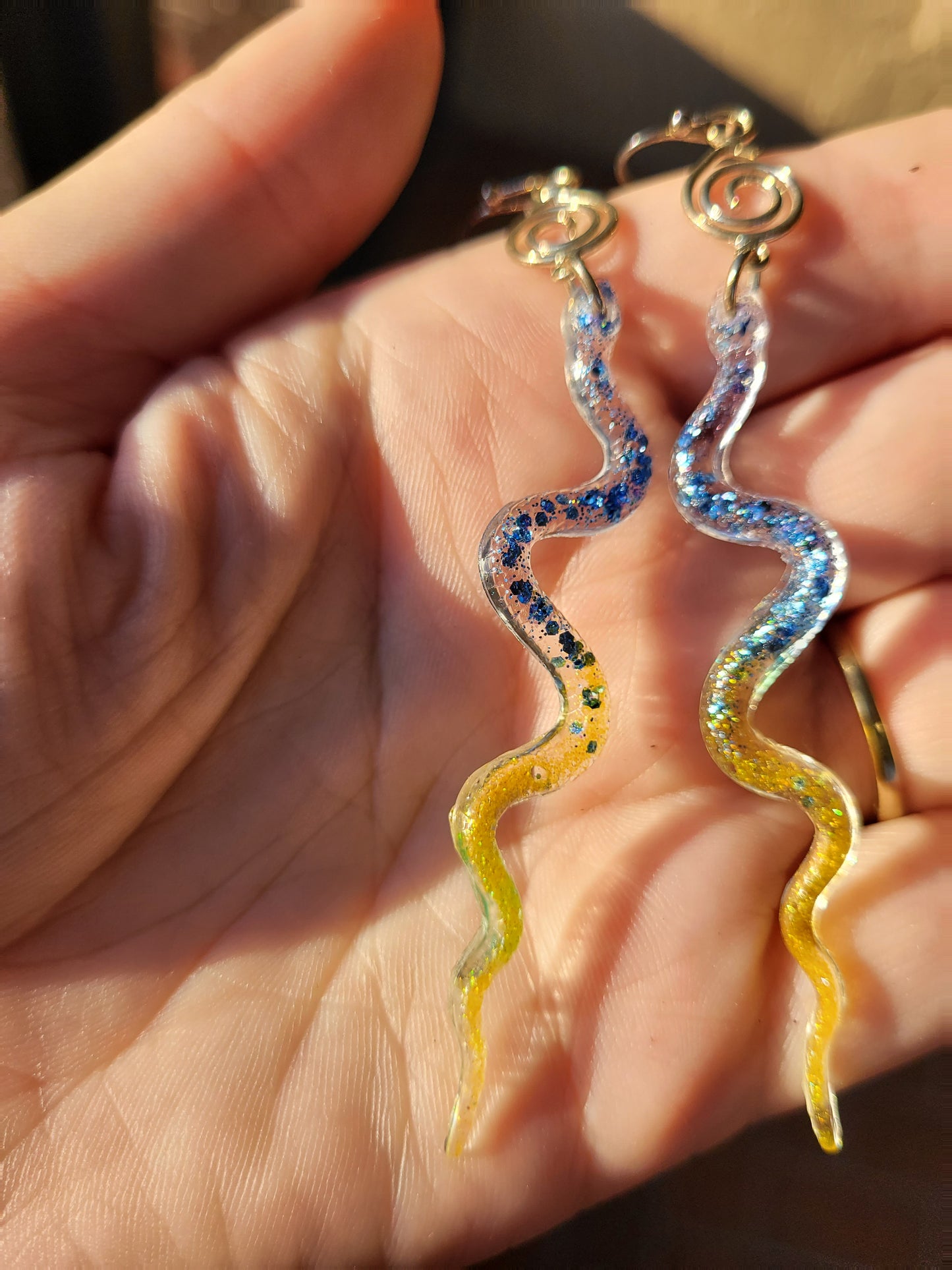 Blue and Yellow Resin Snake Earrings With Swirl Charm