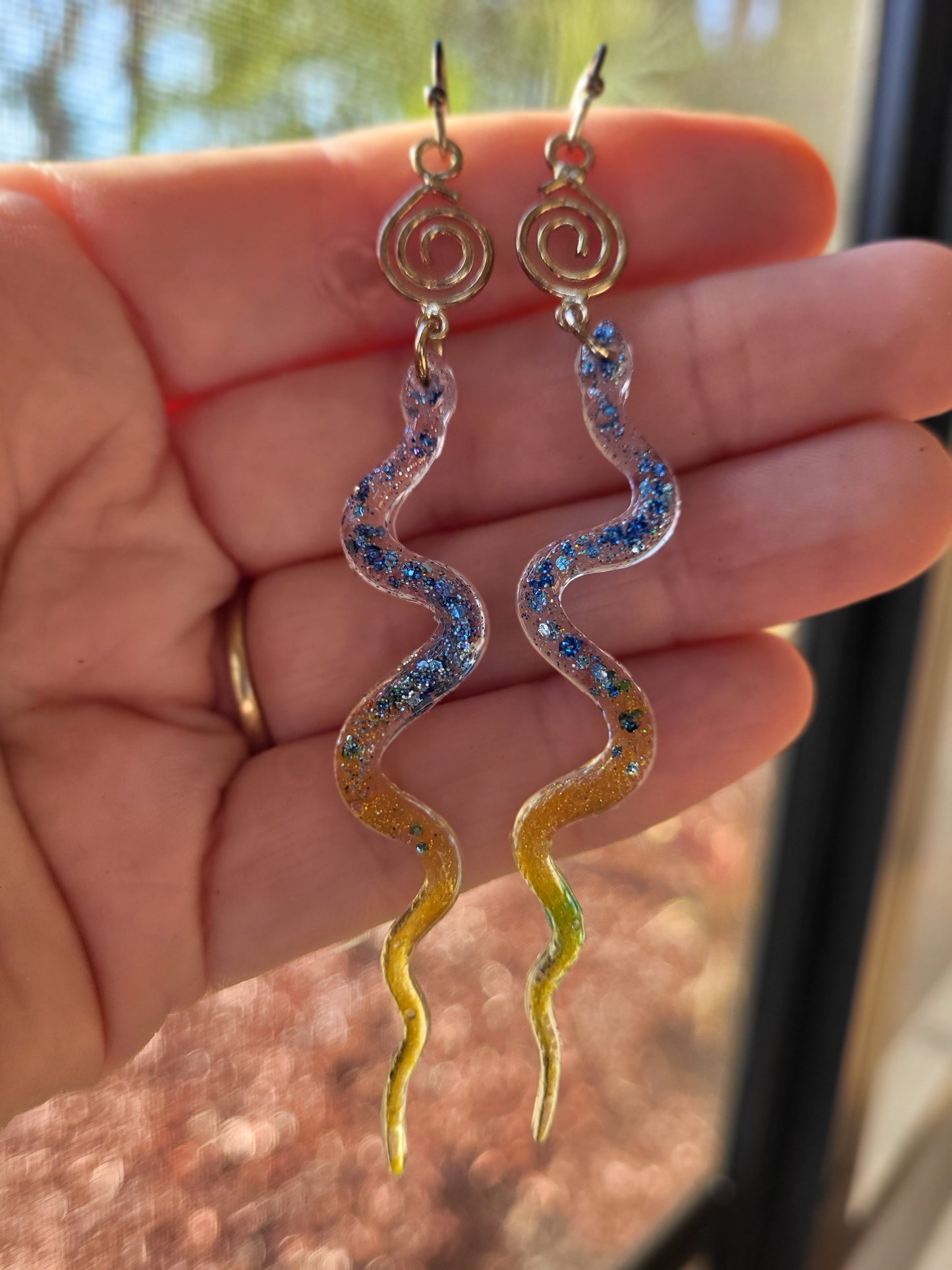 Blue and Yellow Resin Snake Earrings With Swirl Charm