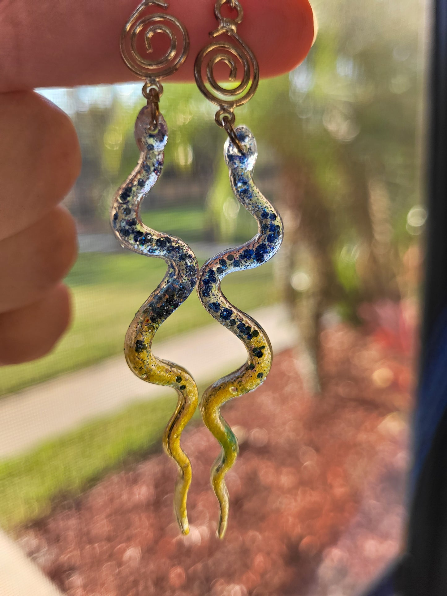 Blue and Yellow Resin Snake Earrings With Swirl Charm