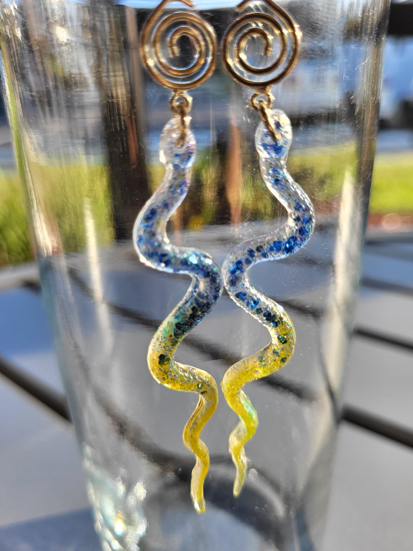 Blue and Yellow Resin Snake Earrings With Swirl Charm