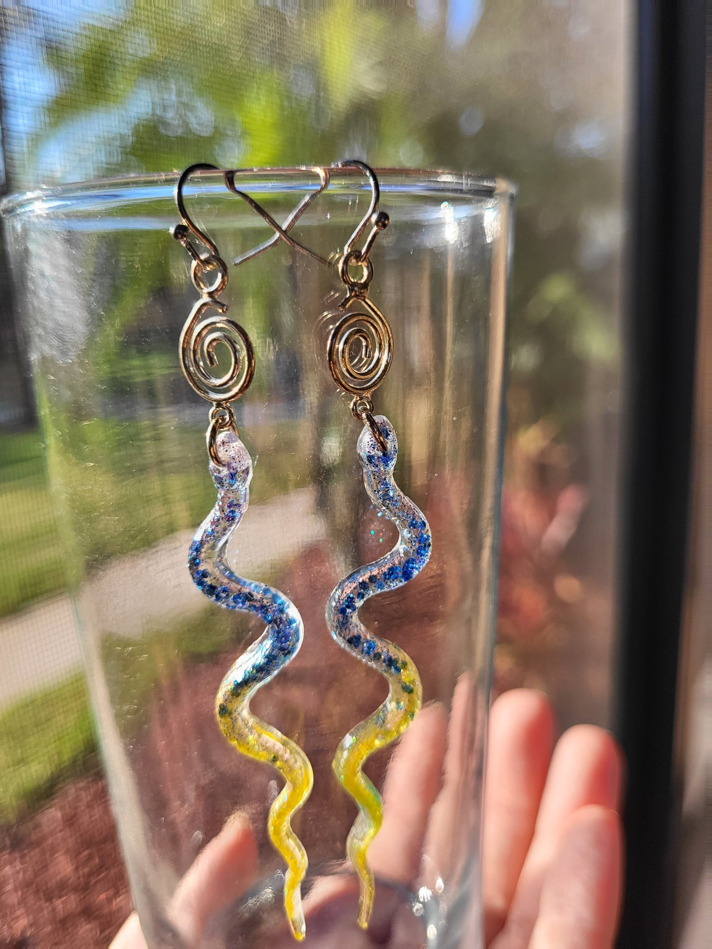 Blue and Yellow Resin Snake Earrings With Swirl Charm