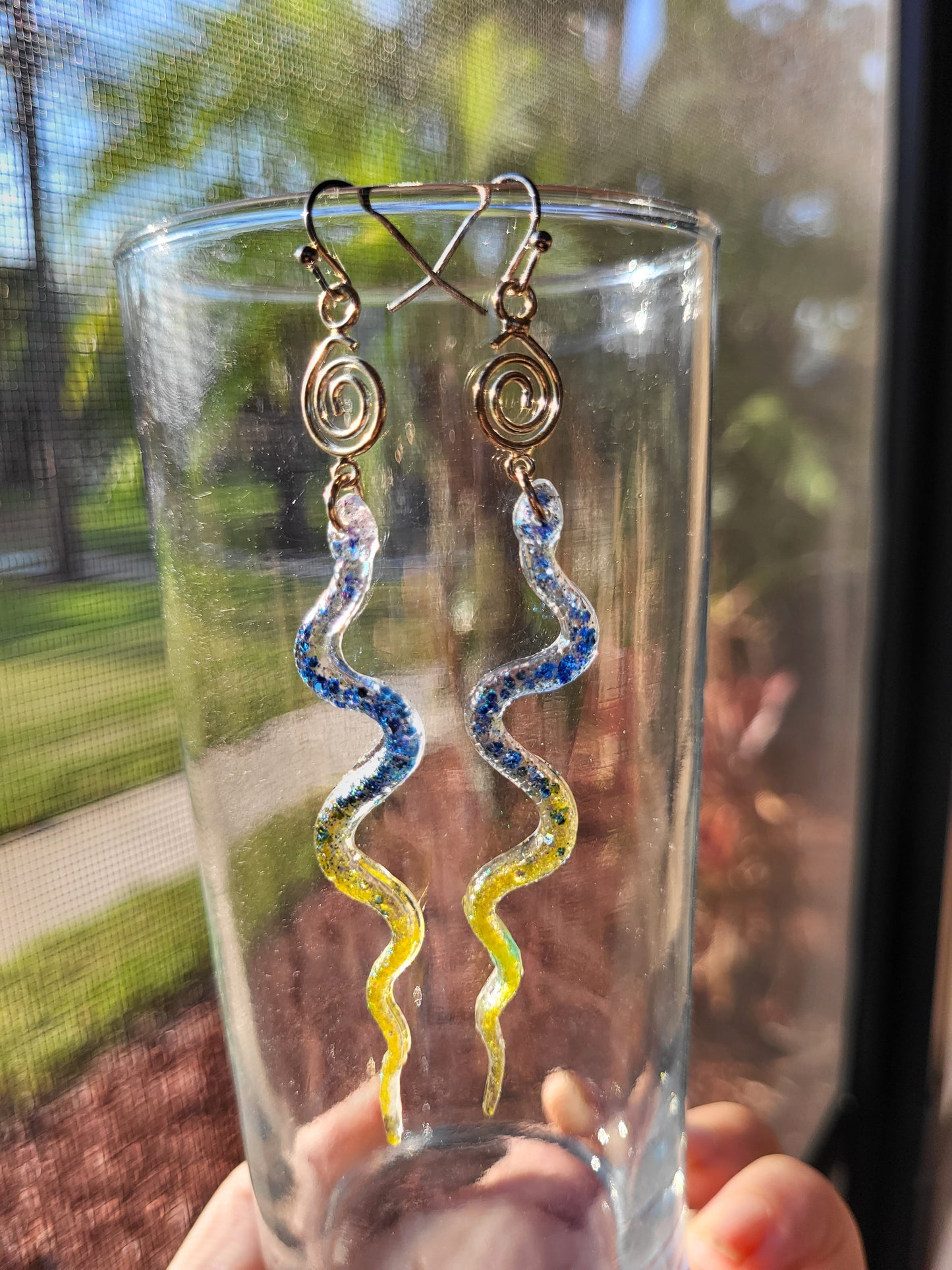 Blue and Yellow Resin Snake Earrings With Swirl Charm