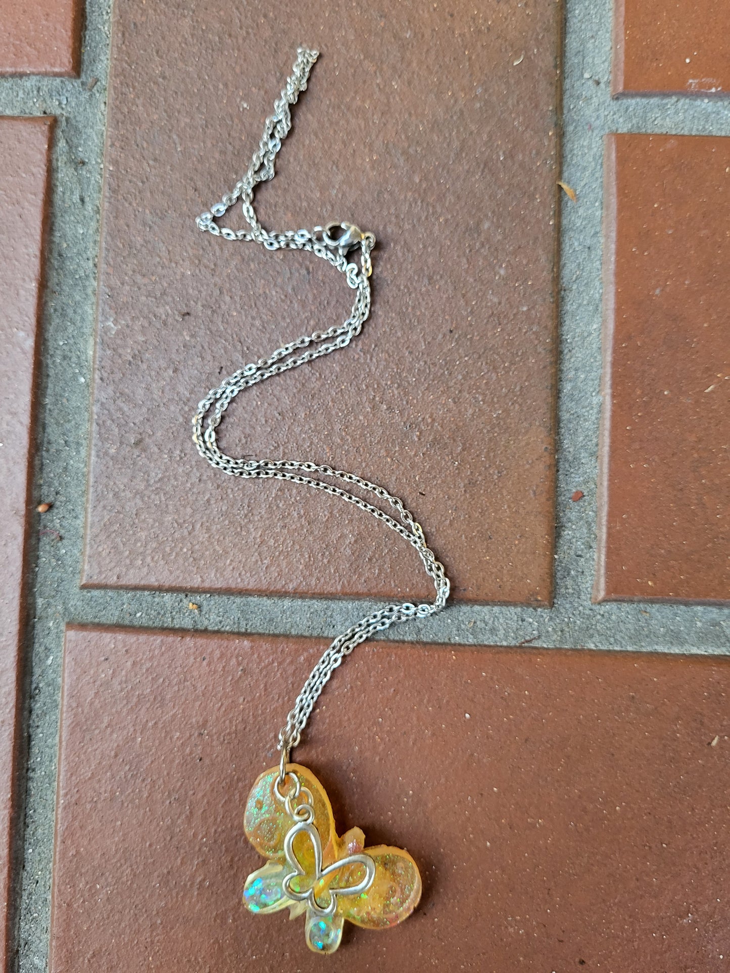 Orange Butterfly Pendant With Butterfly Charm