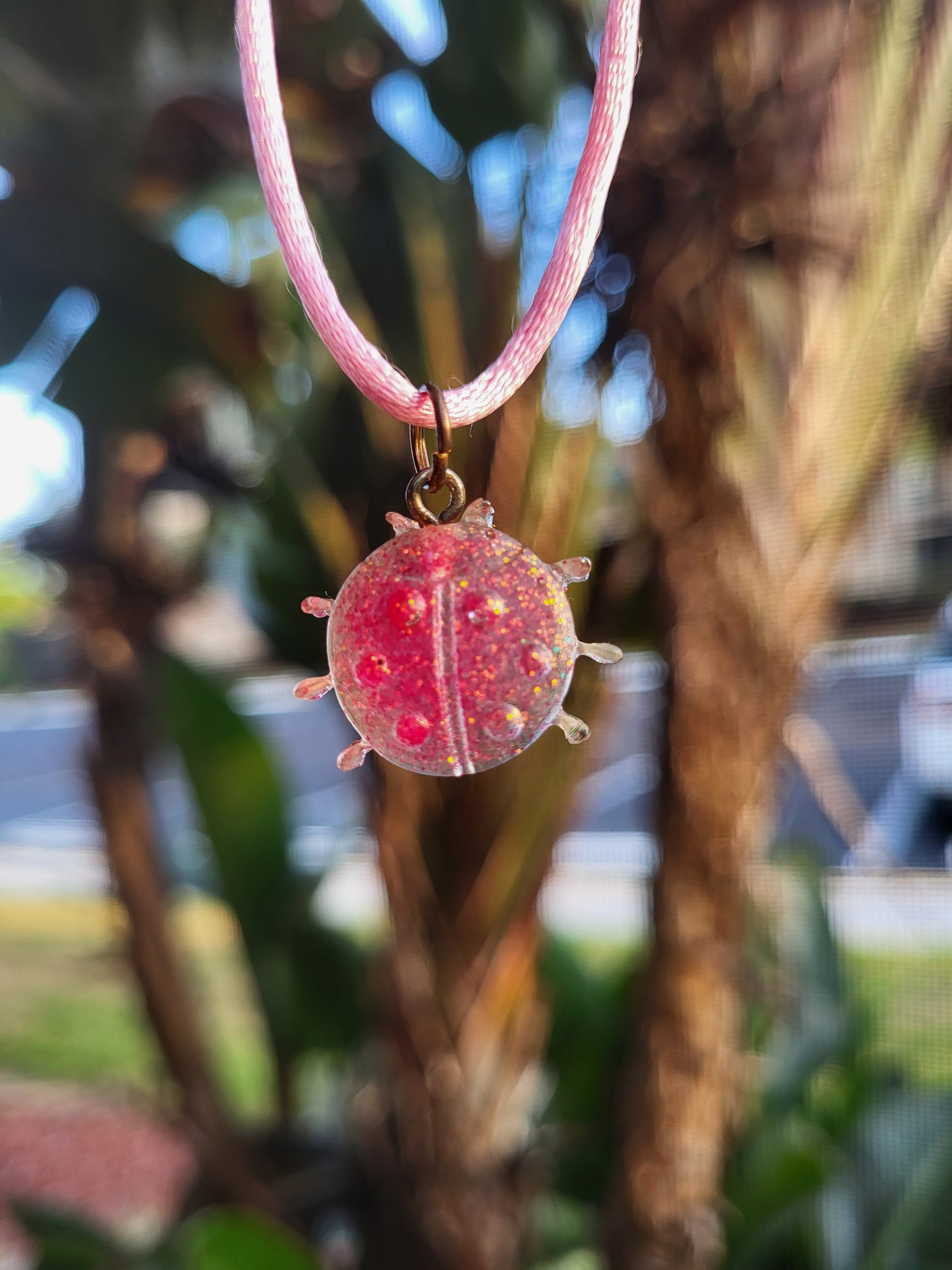 Pink Ladybug Pendant on Pink Cord