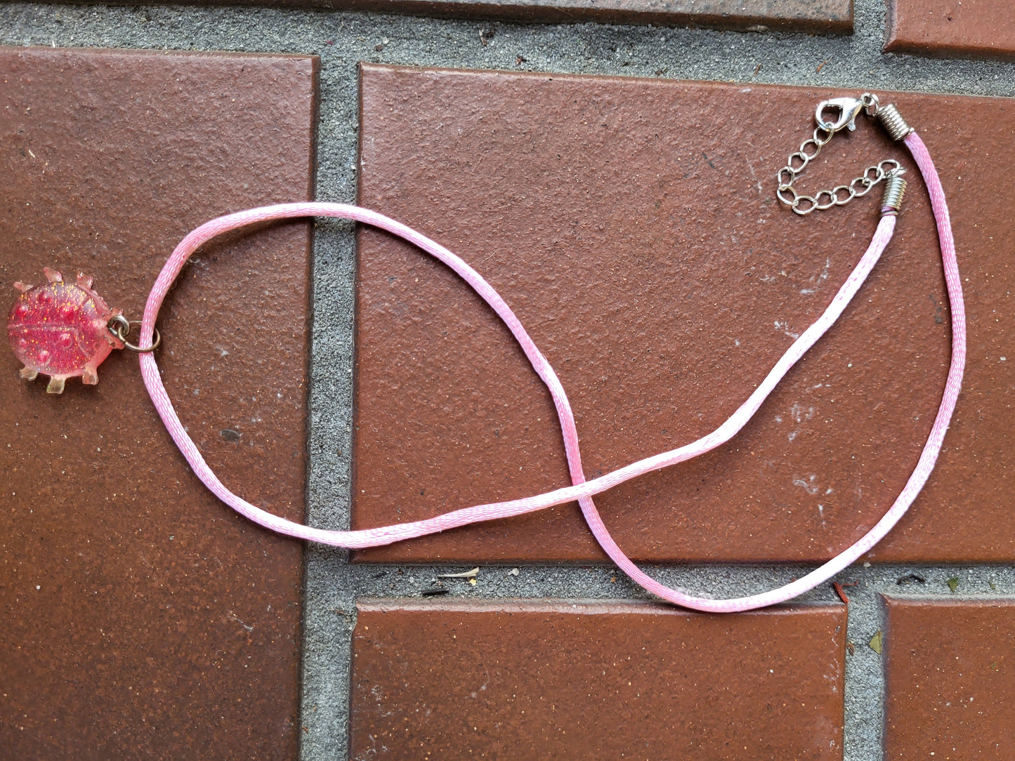 Pink Ladybug Pendant on Pink Cord