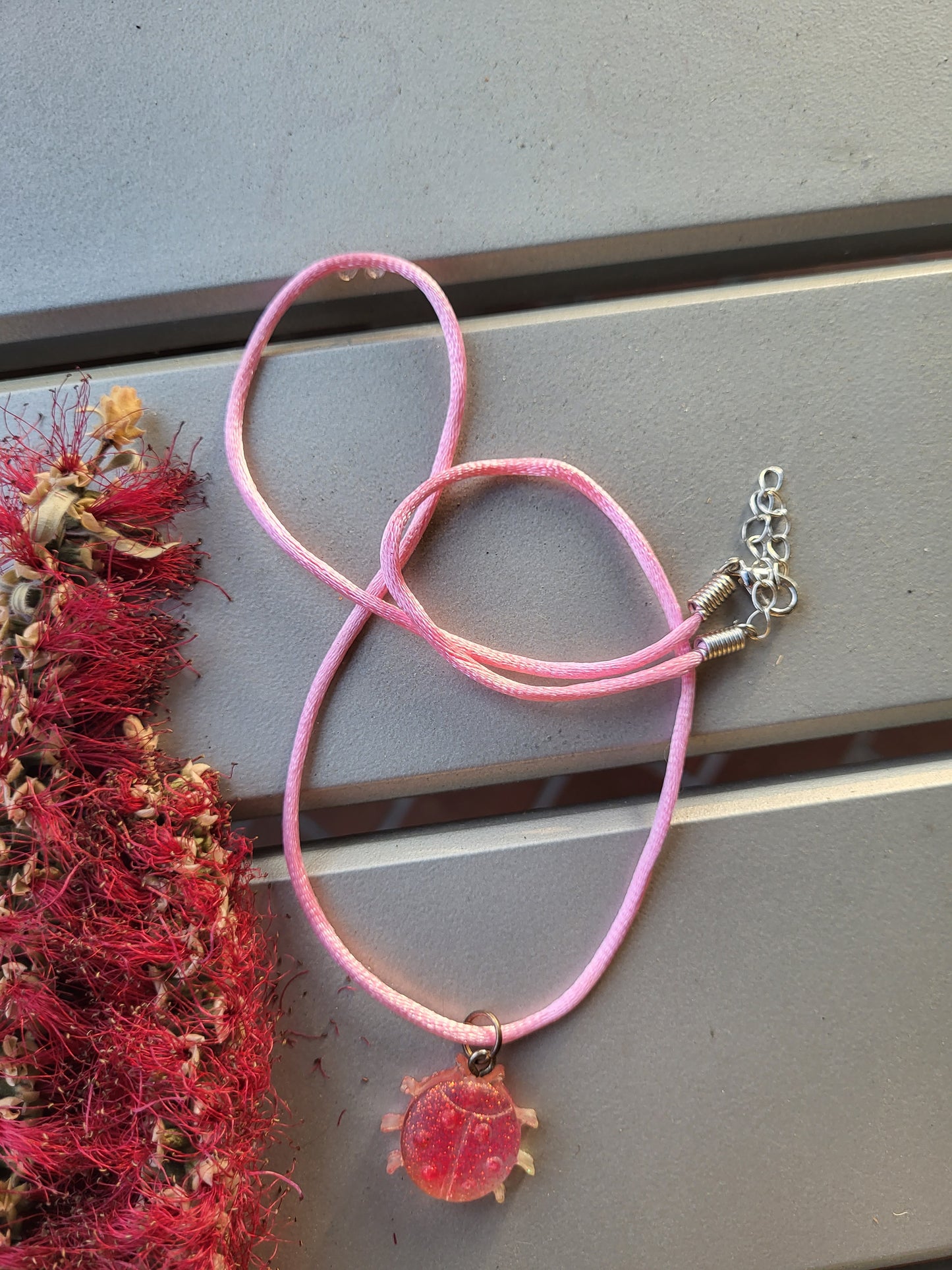 Pink Ladybug Pendant on Pink Cord